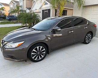 2016 Brown 4-Door Nissan Altima/SV